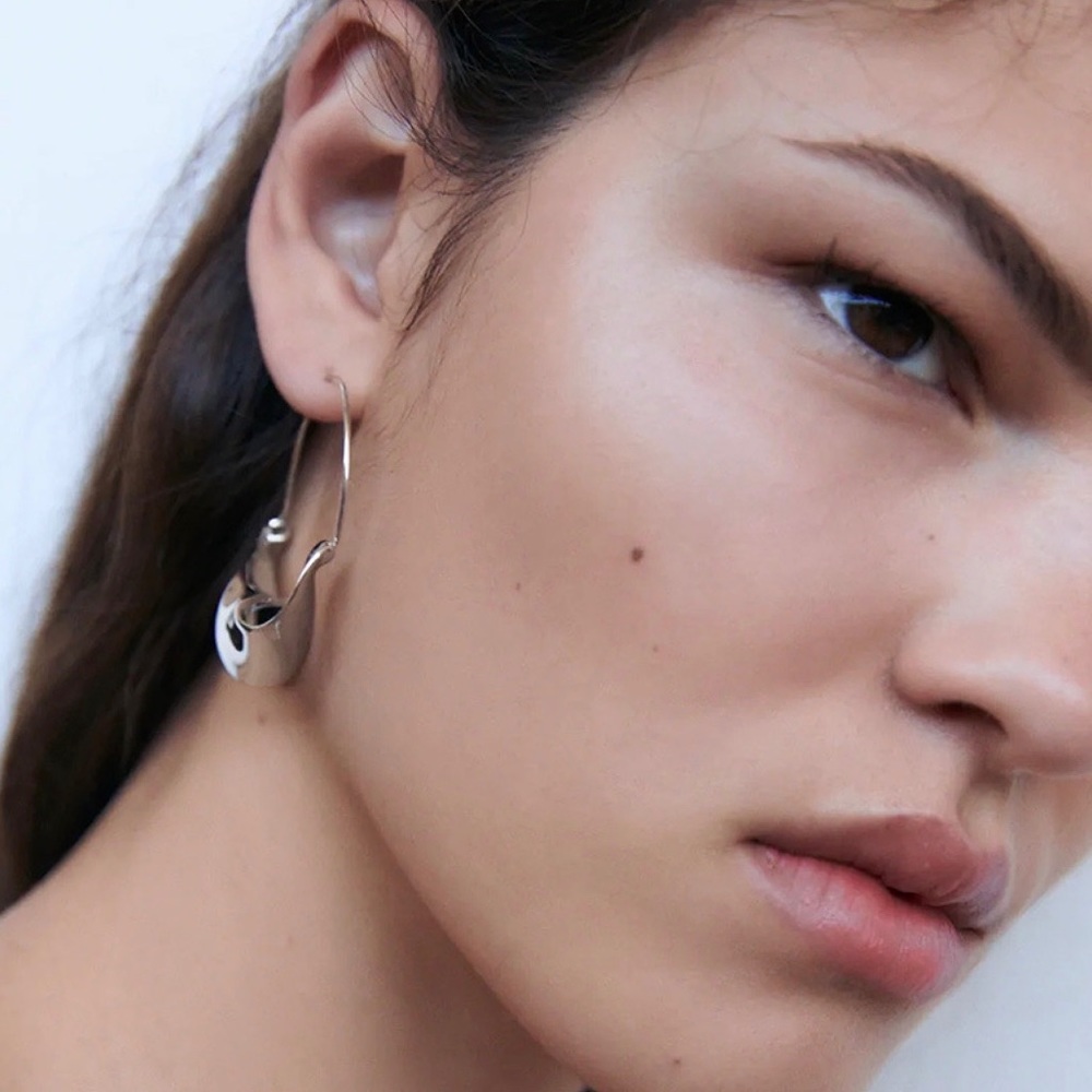 Any 3/$25! Silver Twisted Ribbon Hoop Earrings - Picture 6 of 8